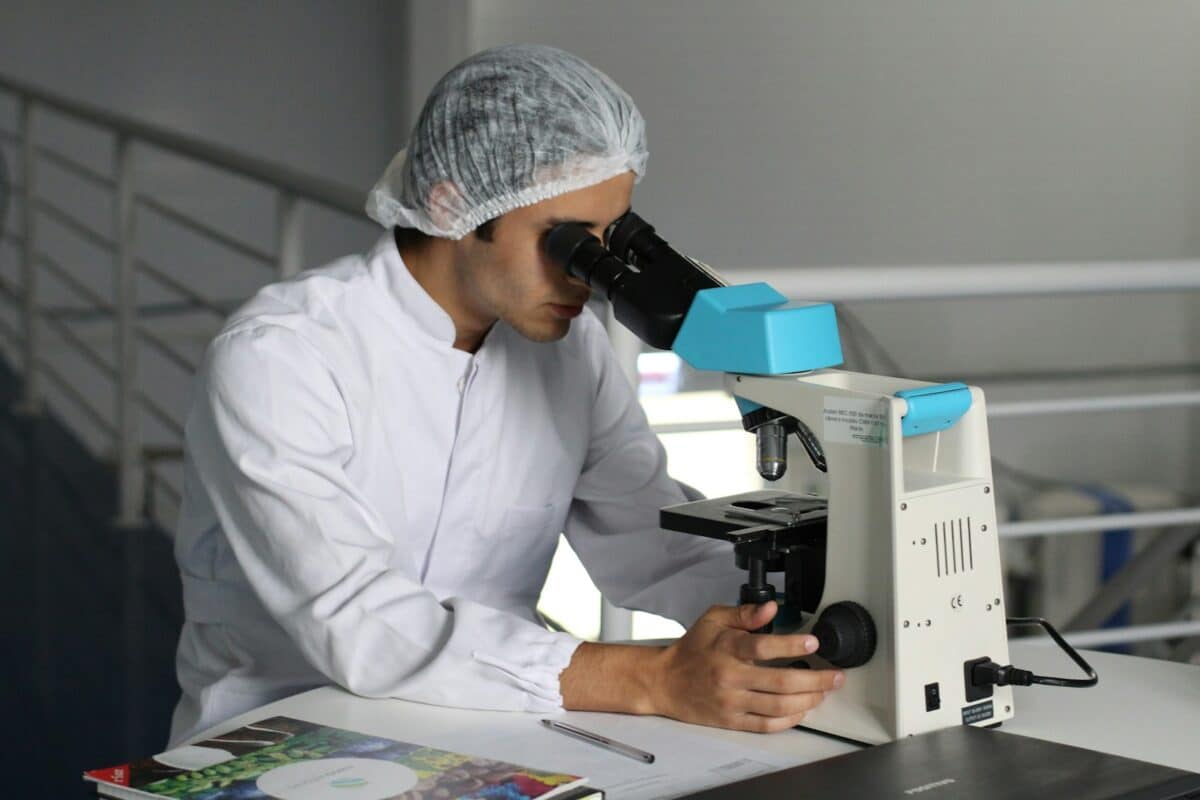 man sight on white microscope, Pesticide Cannabis, California cannabis pesticides