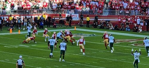 A football game is being played in a stadium, can NFL players smoke weed